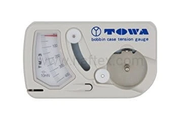 Przyrząd do kontroli naciągu dolnej . nici Towa TM-1