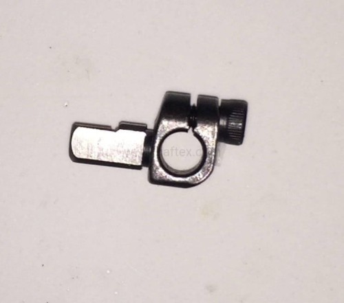 Uchwyt napędu od strony igielnicy